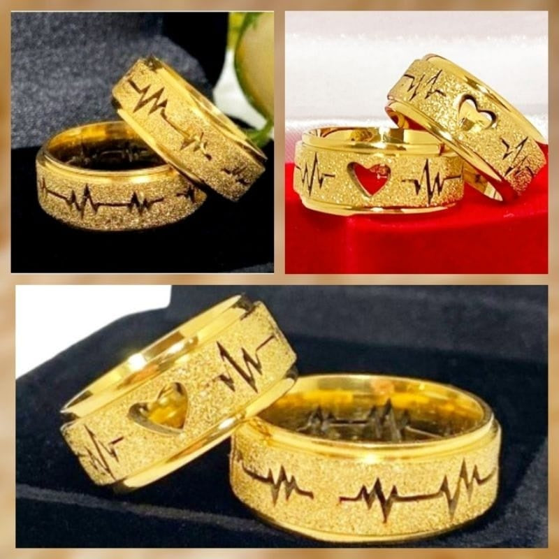Kit de 2 Alianças de Casamento Moeda Antiga Banhadas a Ouro 18k, adornadas com um Coração Vazado e Batimentos Cardíacos Dourados